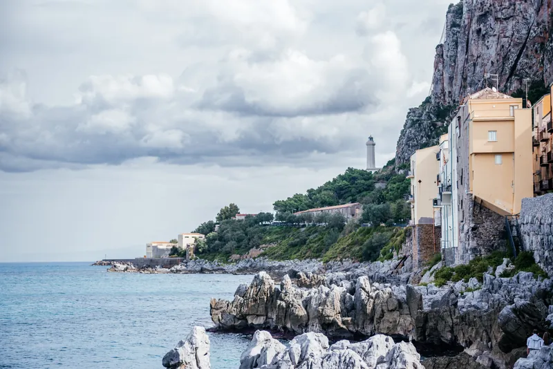 The cliffs and lighthouse along the Cefalù coast