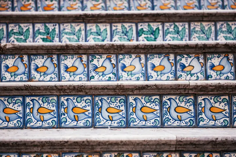 Painted majolica tiled steps in Cefalù's old town